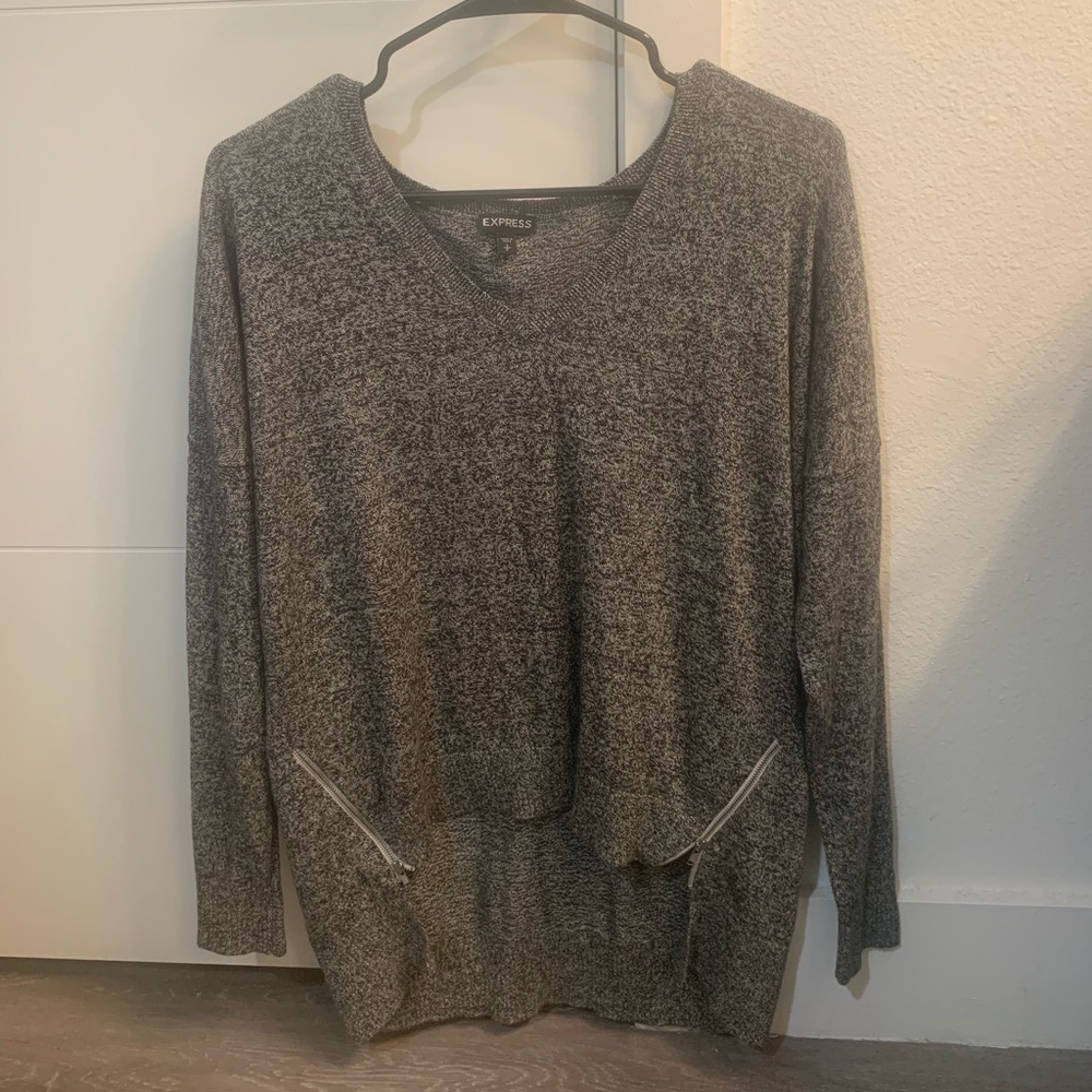 Heathered charcoal gray sweater with zipper slits